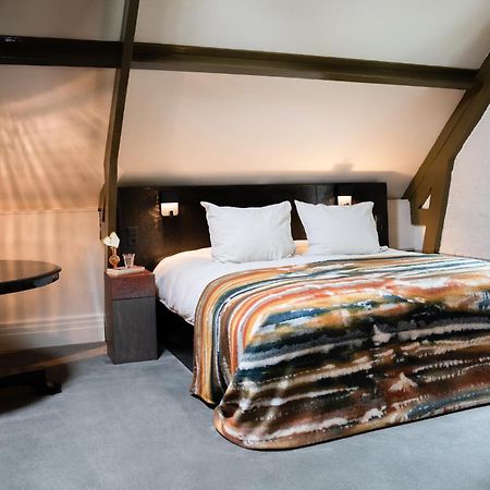 Boutique Hotel Villa Trompenberg ฮิลเวอร์ชุม ภายนอก รูปภาพ