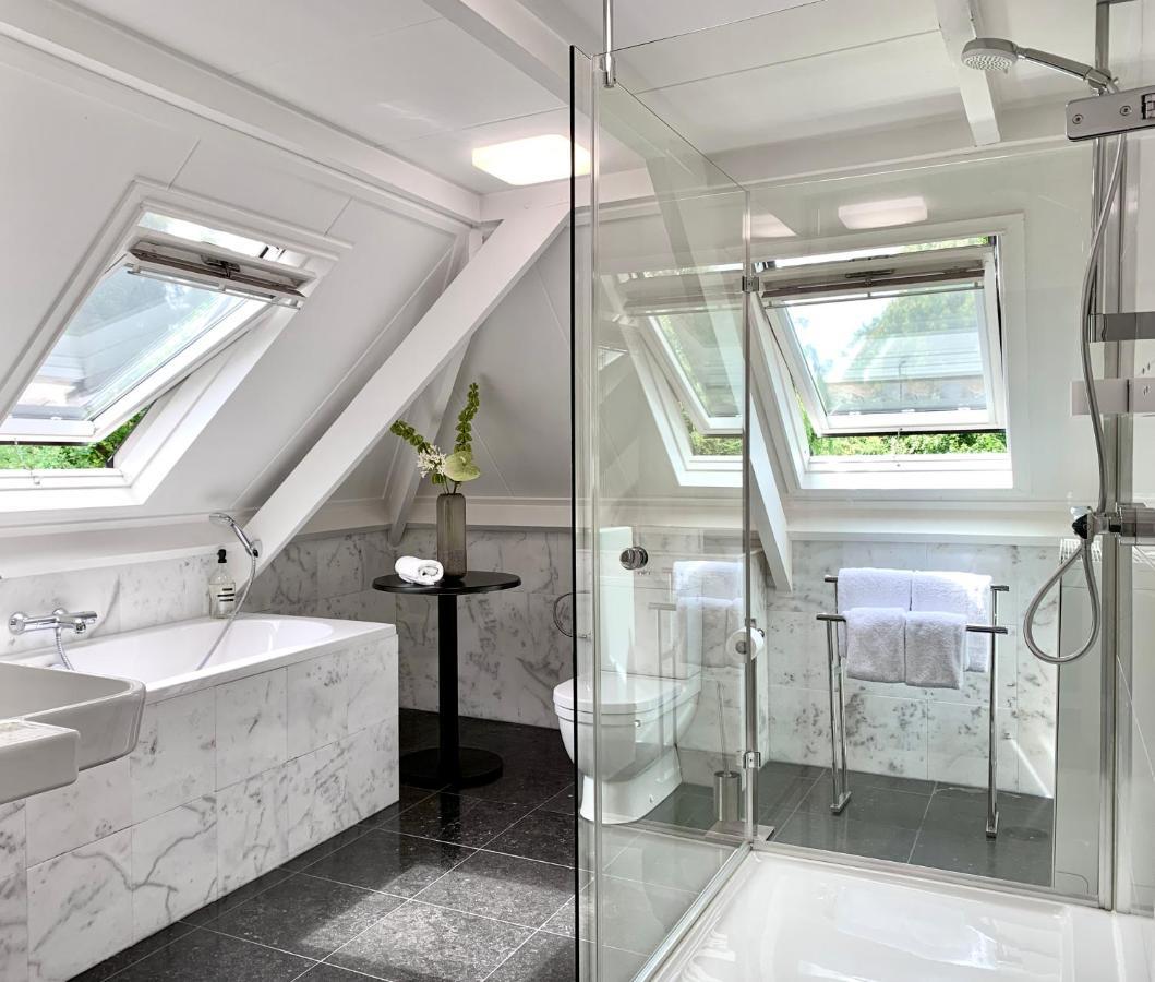 Boutique Hotel Villa Trompenberg ฮิลเวอร์ชุม ภายนอก รูปภาพ