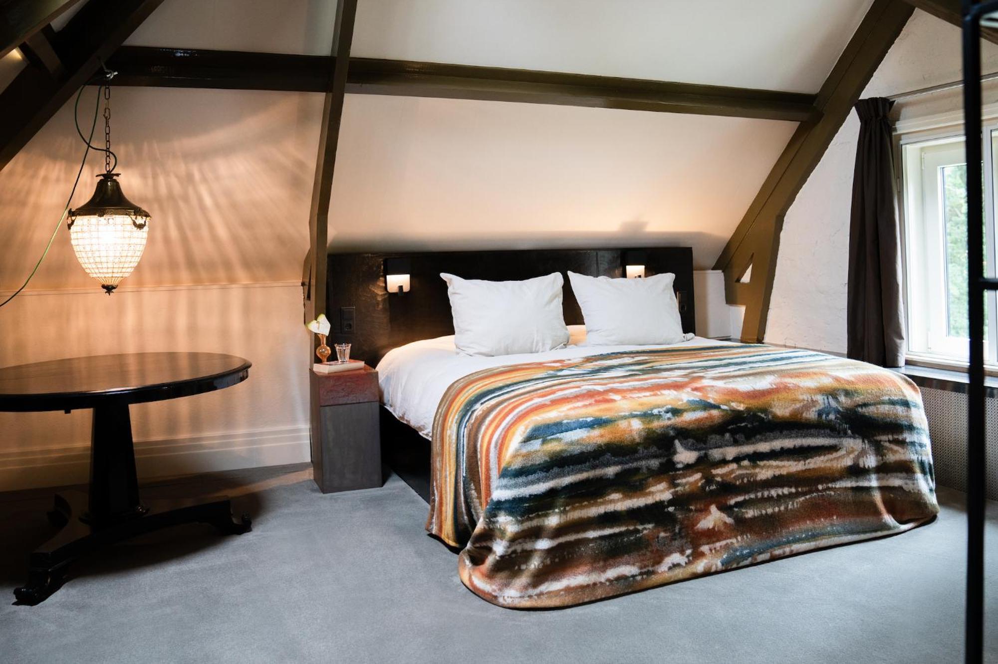 Boutique Hotel Villa Trompenberg ฮิลเวอร์ชุม ภายนอก รูปภาพ