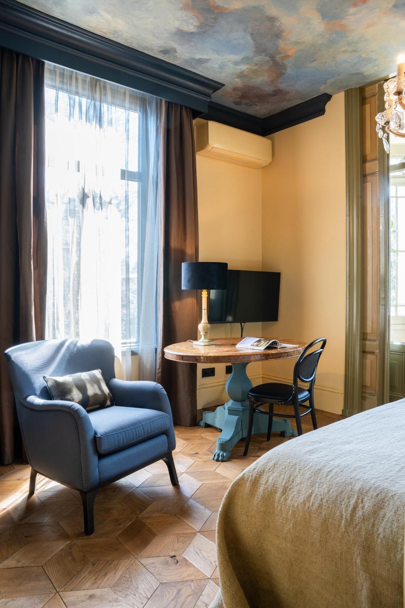Boutique Hotel Villa Trompenberg ฮิลเวอร์ชุม ภายนอก รูปภาพ